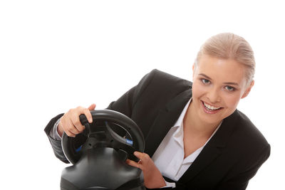 Portrait of a smiling young woman over white background