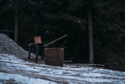 Abandoned snow covered land on field