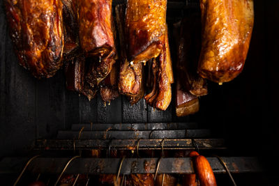 Close-up of meat on barbecue grill