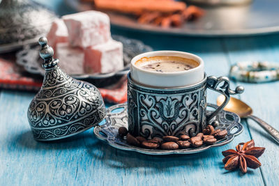 Close-up of coffee cup on table