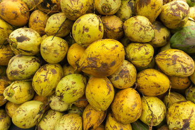 Full frame shot of lemons for sale at market stall