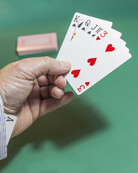 Close-up of hand holding card