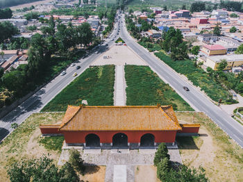 High angle view of road amidst buildings in city