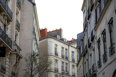 Low angle view of residential buildings against sky