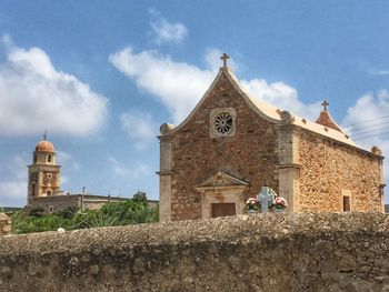 Low angle view of historic building against sky