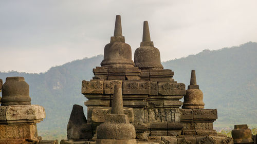 Stupas of building against sky