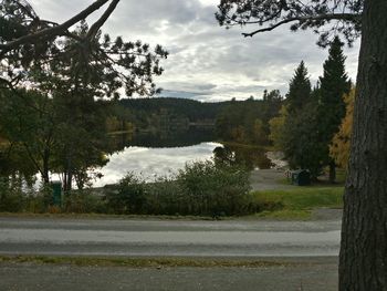 Scenic view of landscape against cloudy sky