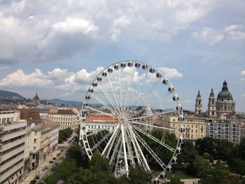 View of city against cloudy sky