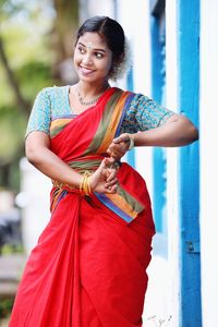 Portrait of smiling young woman dancer 