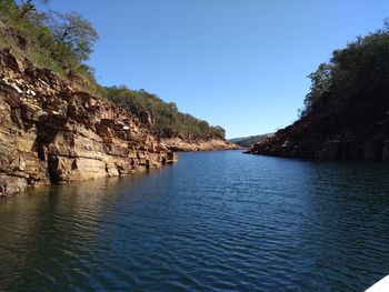 Scenic view of sea against clear blue sky