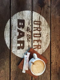 Directly above shot of coffee cup on table