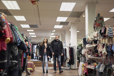 Young couple in clothes shop