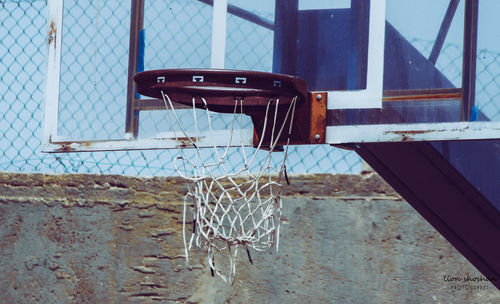 View of basketball hoop against window