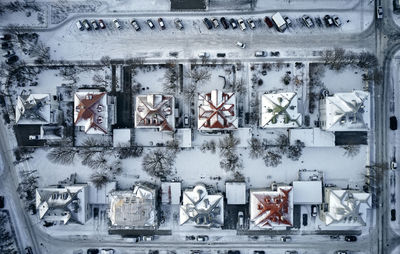 Snow covered residential houses in city district