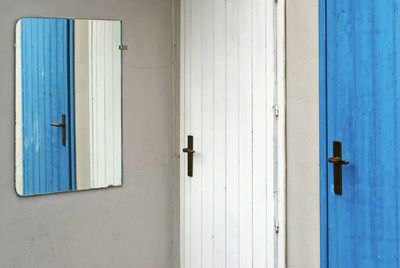 Closed blue door of building