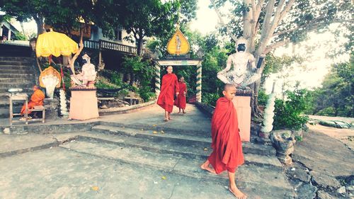 Group of people against temple