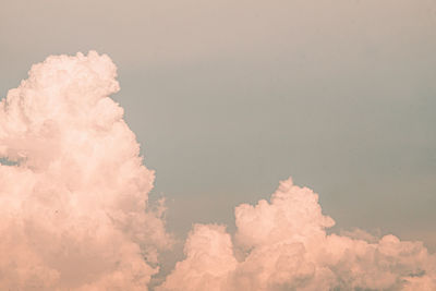 Beautiful white fluffy clouds sky background abstract season and weather.