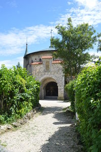 Entrance of historic building against sky