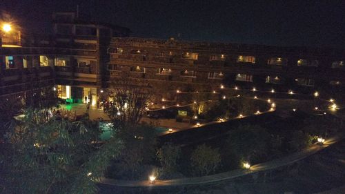 High angle view of illuminated buildings at night