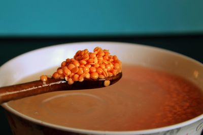 Close-up of lentils in bowl on table
