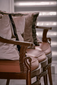 Close-up of empty chair on table