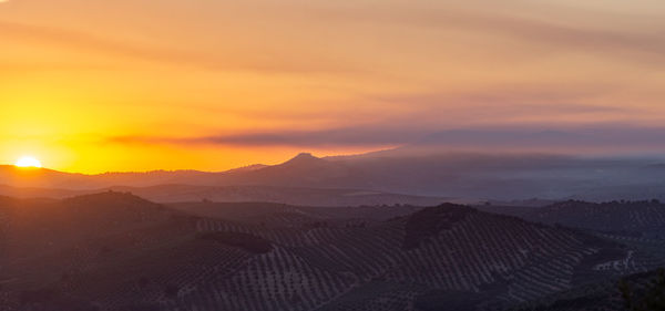 High angle view of landscape against sky during sunset