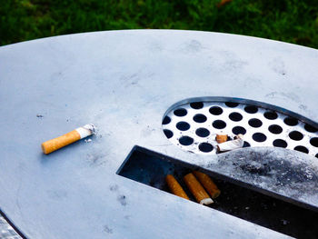 Close-up of cigarette on ashtray