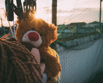 Close-up of stuffed toy hanging in park