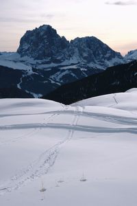 Scenic view of snowcapped mountains against sky. winter hike around seceda, south tyrol, italy