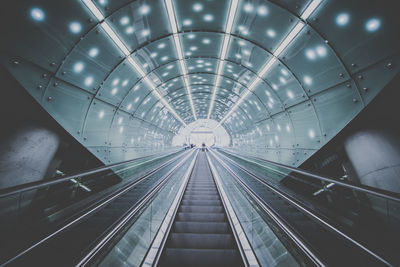 Low angle view of escalator at subway station