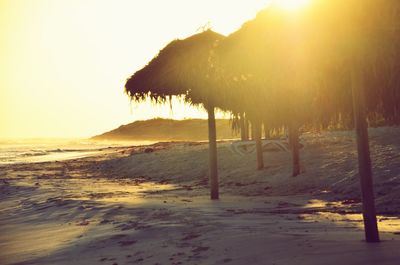 Scenic view of beach against clear sky