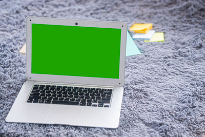 High angle view of laptop on table