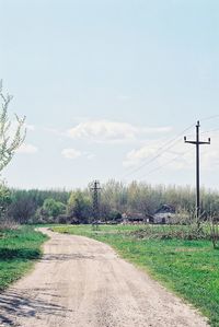 Country road passing through field