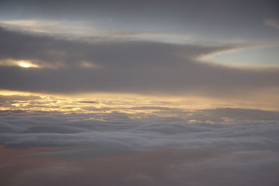 Low angle view of clouds in sky during sunset