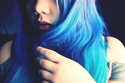Close-up of young woman with dyed hair