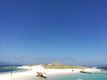 View of sea against blue sky