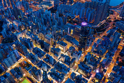 High angle view of illuminated buildings at night