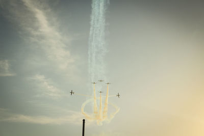 Low angle view of vapor trail against sky