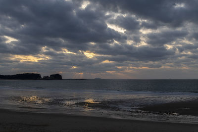 Scenic view of sea against sky during sunset