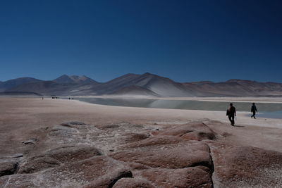 Scenic view of desert against clear sky