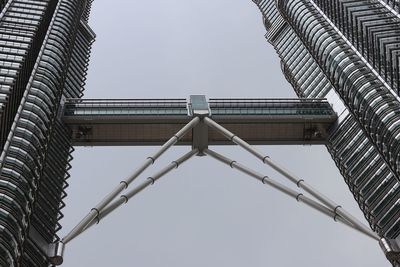 Low angle view of modern buildings against clear sky