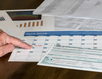 High angle view of text on paper at table