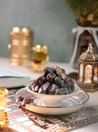 Sukari dates fruit in white bowl on the table