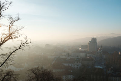 High angle view of cityscape during foggy weather