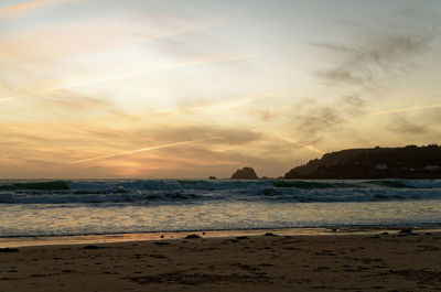 Scenic view of sea against sky during sunset
