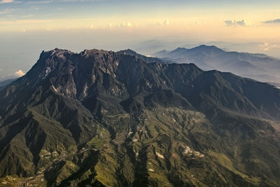 Scenic view of mountains against sky during sunset