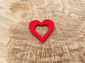 High angle view of heart shape on wood