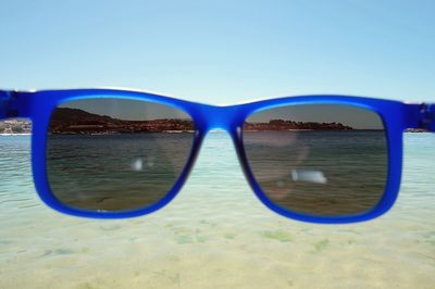 Close-up of water against clear blue sky