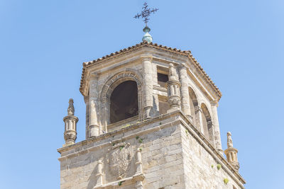 Low angle view of historic building against clear sky