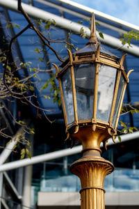 Low angle view of old street lamp